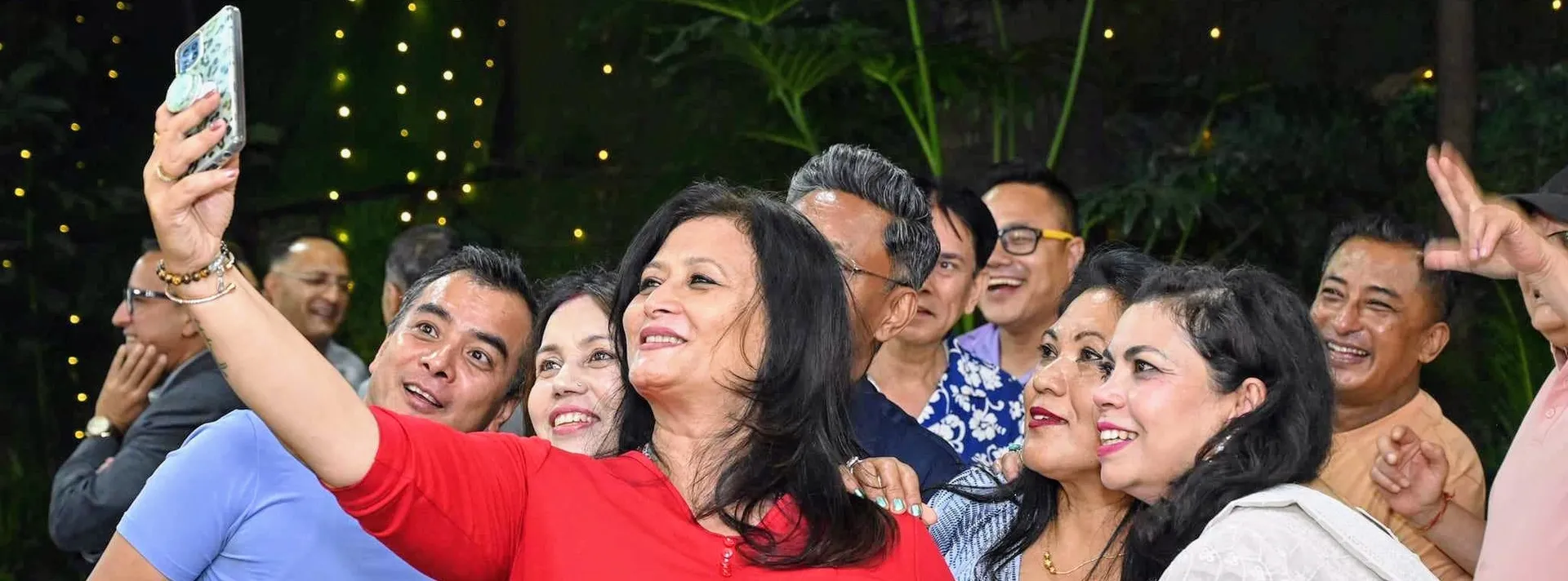Arniko alumni taking a group selfie together at an AAAK gathering