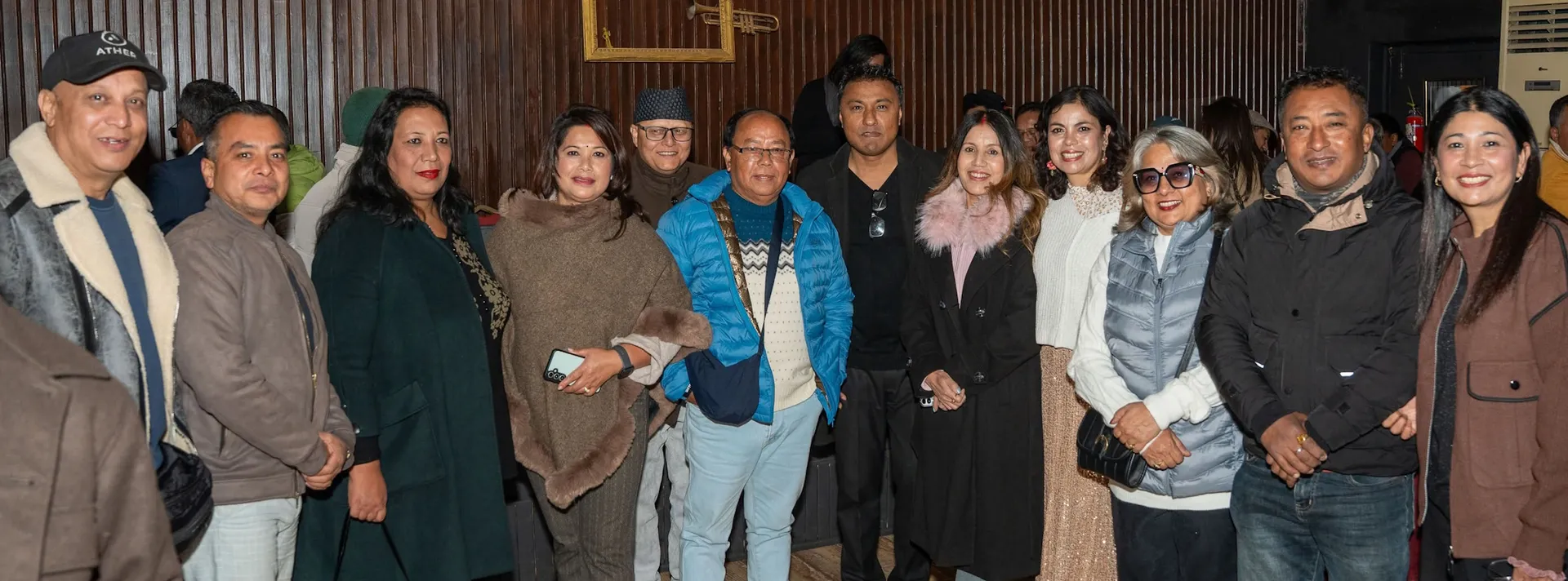 Alumni together at an AAAK winter evening gathering